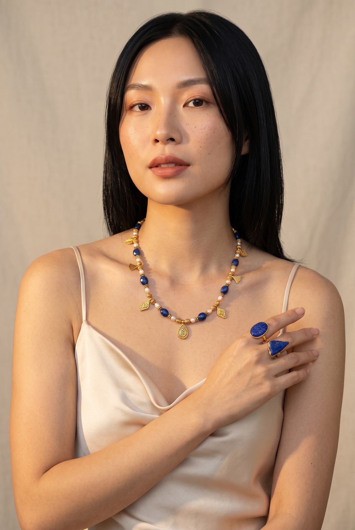 Nīlapadma | Lapis Lazuli Carved Floral Oval Cocktail Ring in 22k Gold Plated